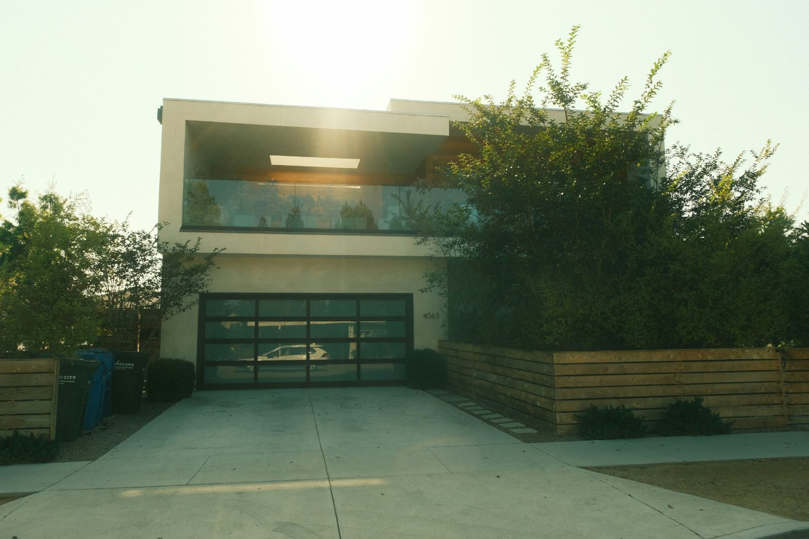Concrete driveway leading to a modern home in Colorado Springs, CO